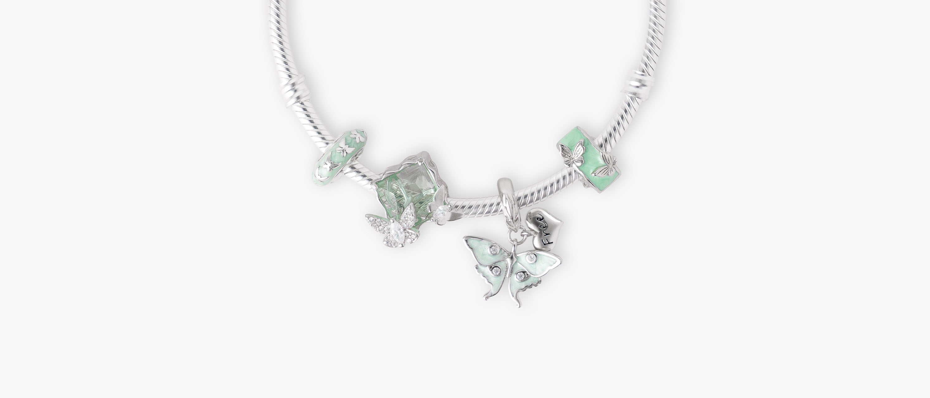 Armband mit Charms Set MINT WINGS aus 925 Sterling-Silber, Flatlay – Charmerie