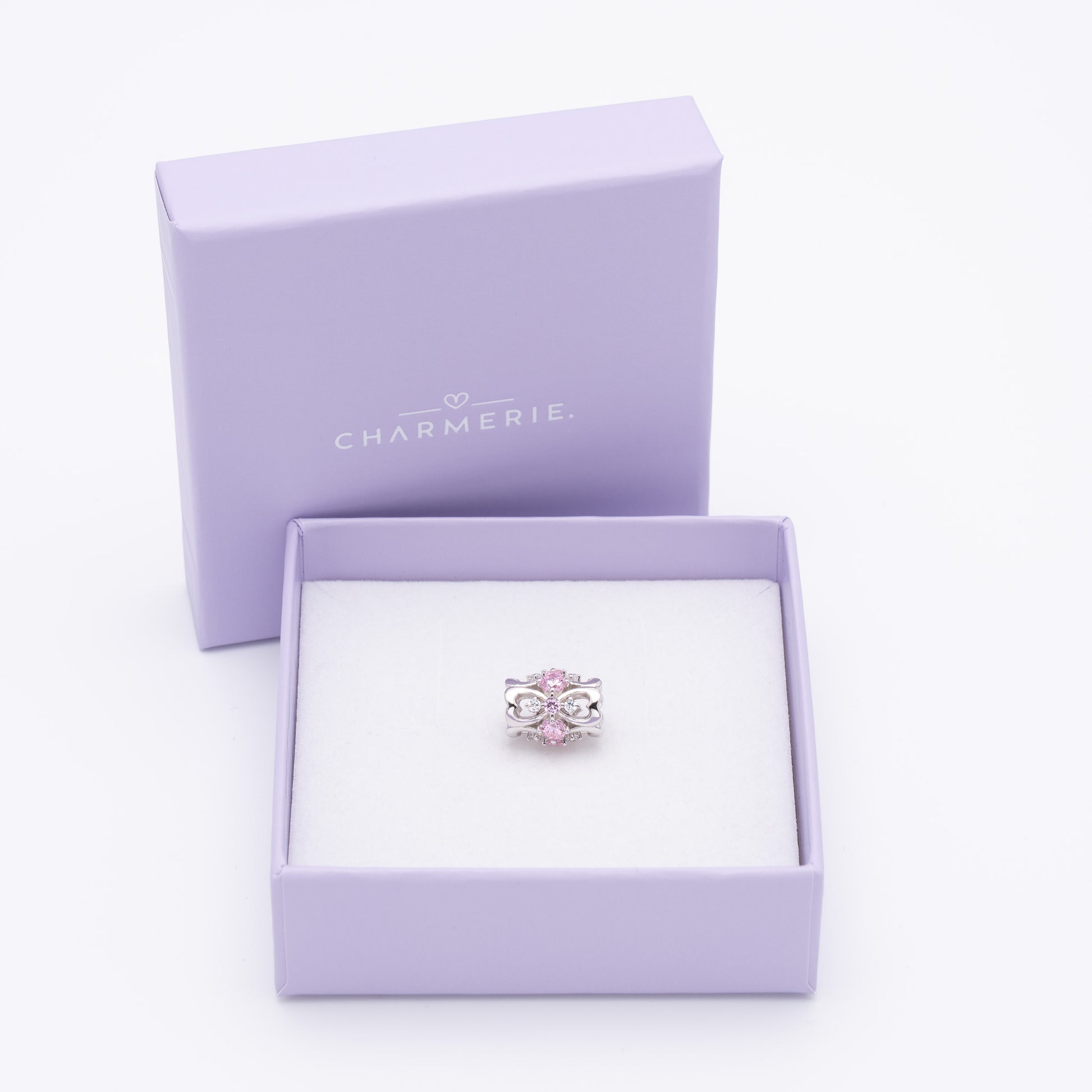 Edler Herz-Band Charm mit rosa Zirkonia aus 925 Sterling-Silber in Charmerie Geschenkbox