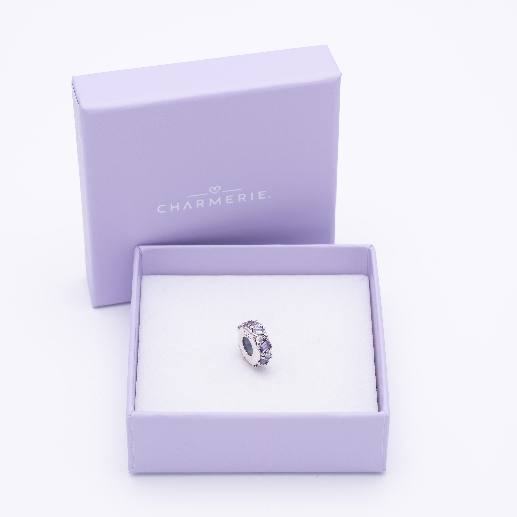 Funkelnder Charm Stopper mit lila Zirkonia aus 925 Sterling-Silber in Charmerie Geschenkbox